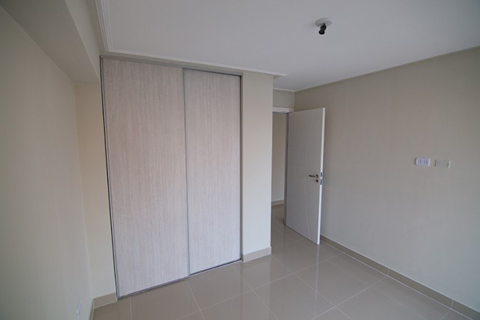 1 Dormitorio A con patio - Edificio Miraggio